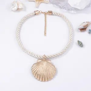 Minimalist twisted rope necklace featuring a large golden seashell pendant for women
