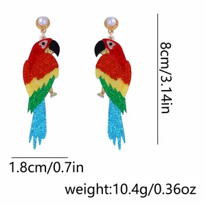 Vue détaillée de boucles d'oreilles perroquet pailletées avec dimensions et poids
