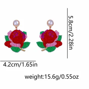 Boucles d'oreilles rose pailletée avec perle, dimensions 5,8cm et poids 15,6g