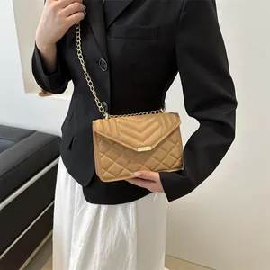 Chic khaki quilted chain crossbody bag with elegant diamond pattern and V-stitch