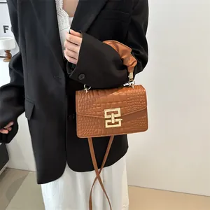 Brown crocodile pattern PU leather handbag for women featuring a gold square buckle
