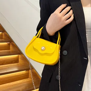 Mini yellow jelly handbag for kids with pearl buckle and gold chain strap