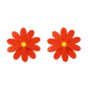 Oversized red PU leather daisy stud earrings with yellow center for a fresh vacation look
