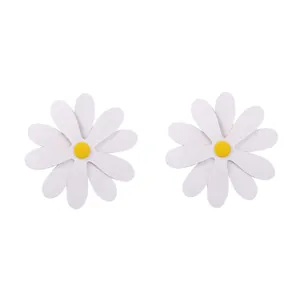 Close-up of oversized PU leather daisy stud earrings with white petals and yellow centers