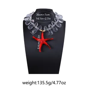 Detailed view of oversized red starfish pendant and colorful resin beads on a neck model