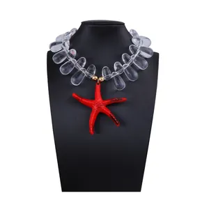 Exaggerated beach necklace with red starfish pendant and transparent teardrop beads