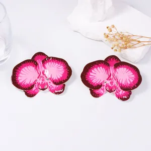 Dramatic pink enamel orchid flower stud earrings with elegant metal gradient for women