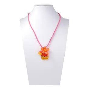Collana di Halloween fatta a mano con ciondolo a zucca arancione e cordoncino rosa