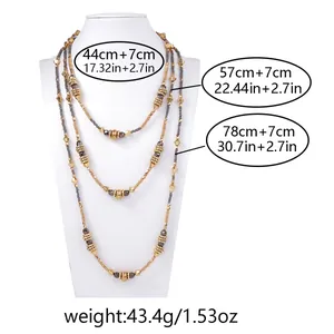 Three-layer CCB beaded necklace in gold and taupe tones showing 44 to 78 cm length detail