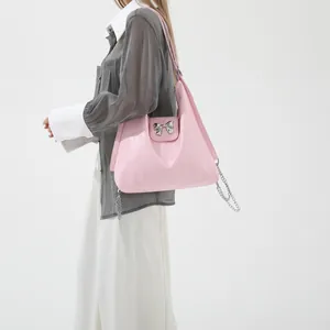 Pink soft PU hobo shoulder bag with silver bow detail and chain strap for women