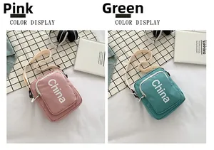 Detailed comparison of pink and green canvas shoulder bags with China typography