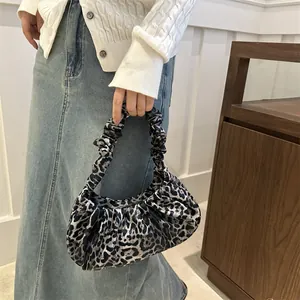 Fashionable leopard print croissant handbag with scrunchie handle for autumn casual style