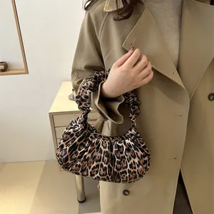 Chic leopard print scrunchie handbag for women featuring a minimalist square silhouette