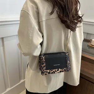 Fashionable leopard print crossbody chain bag with faux leather panel for women