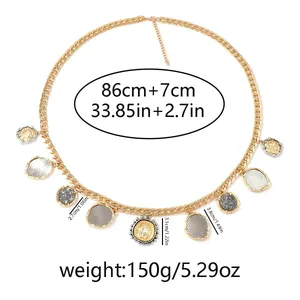 Detail view of gold chunky chain belt with coin charms showing dimensions and weights