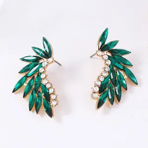 Elegant gold feather stud earrings with green marquise stones and zircon accents