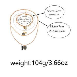 Detail view of multi-layered alloy chain necklace showing lengths 44cm, 55cm, and 75cm