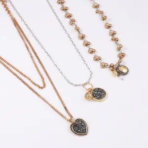 Three-layer alloy necklace set with geometric badge pendants and textured metal chains