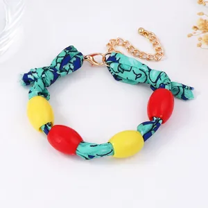 Bohemian colorful beaded rope bracelet with geometric print and gold lobster clasp