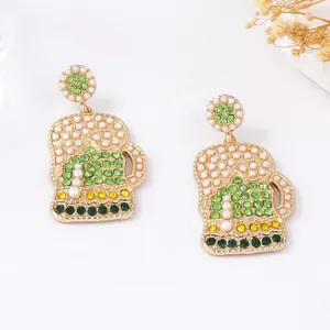 St. Patrick's Day green rhinestone beer mug earrings with white pearls and gold base