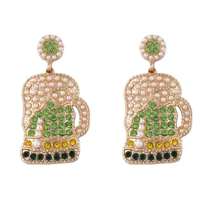 St. Patrick's Day beer mug earrings with green rhinestones and white pearls