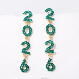Detail of 2026 number drop earrings with sparkling green rhinestones in gold plating