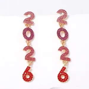 Detailed view of 2026 number drop earrings with colorful pink and red gradient rhinestones