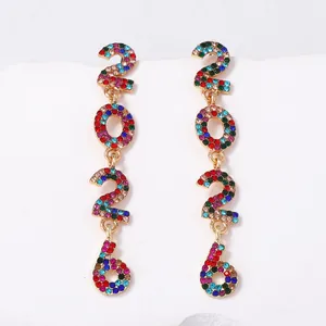 Detailed macro view of 2025 alloy drop earrings with vibrant multicolored rhinestones