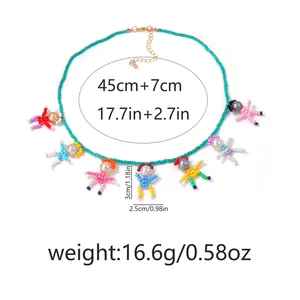Detail of beaded necklace showing length 45+7cm and weight 16.6g with cartoon pendants