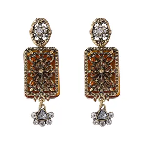 Vintage bohemian drop earrings with amber resin and sparkling crystals in bronze finish