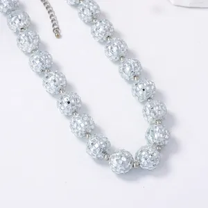 Minimalist silver disco ball beaded necklace with faceted reflective spheres and lobster clasp