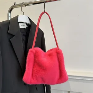 Hot pink plush shoulder bag for women with minimalist fluffy faux fur texture