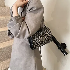 Fashion leopard print shoulder bag with metallic studs and silver chain strap for women