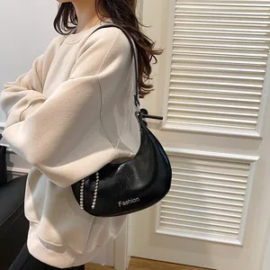 Chic black glossy crescent shoulder bag with silver Fashion print and bead chain