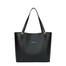 Classic black leather tote bag with gold metal logo and minimalist professional style