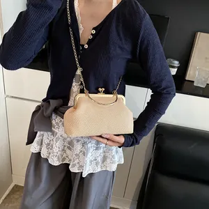 Elegant beige woven clutch bag with gold chain strap and metal handle for evening party