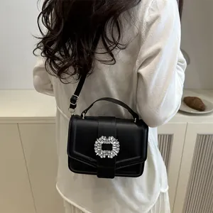 Classic black leather crossbody bag with sparkling rhinestone square buckle and chain strap