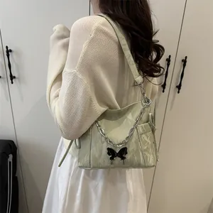 Minimalist sage green butterfly shoulder bag with silver chain and marble texture