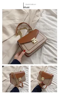 Detail of khaki crossbody bag featuring golden hardware and a chain shoulder strap