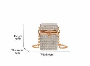 Detailed view of rhinestone evening clutch with dimensions 9x6x6cm and chain strap