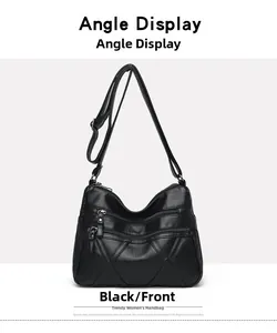 Front view of black multi-zipper PU leather crossbody bag with geometric stitching
