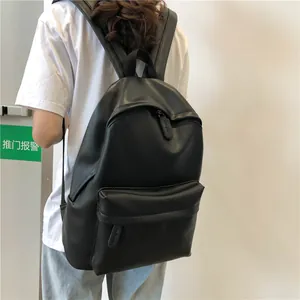 Minimalist black PU leather backpack with front zipper pocket and large capacity