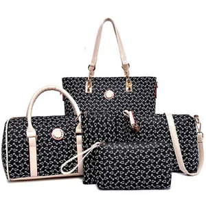 Set of four black printed bags including tote and crossbody styles with cream handles