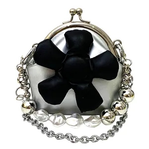 Silver mini crossbody bag for kids with large black leather flower and pearl chain strap