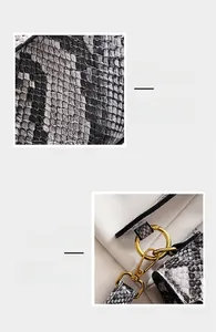 Detailed macro view showing snakeskin texture and golden metal hardware of the crossbody bag