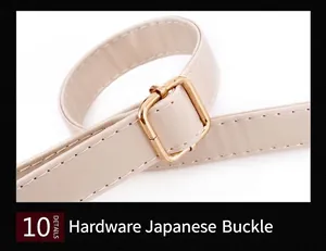 Macro detail of adjustable golden buckle and premium cream leather strap on bag