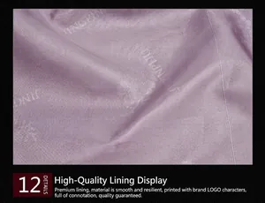Close-up of light purple handbag inner lining with silk-like texture and brand logo