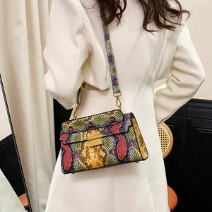 Colorful snake pattern crossbody bag with golden lock and rectangular flap design