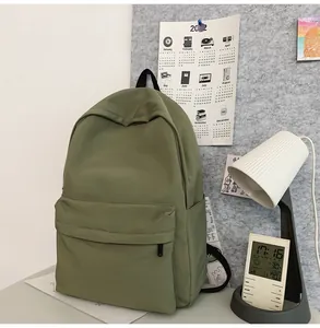 Olive green large capacity backpack with front zipper pocket and side water bottle holder