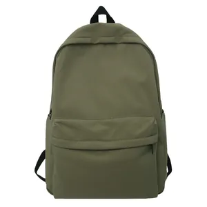 Minimalist olive green canvas backpack with large capacity and multi-functional pockets